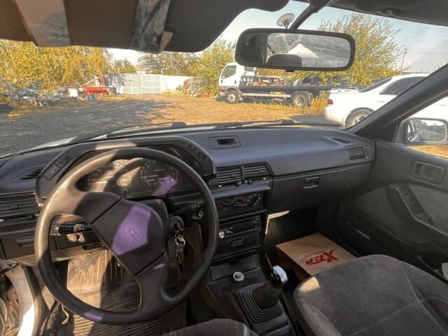 Білий Міцубісі Lancer, об'ємом двигуна 1.8 л та пробігом 350 тис. км за 2100 $, фото 7 на Automoto.ua