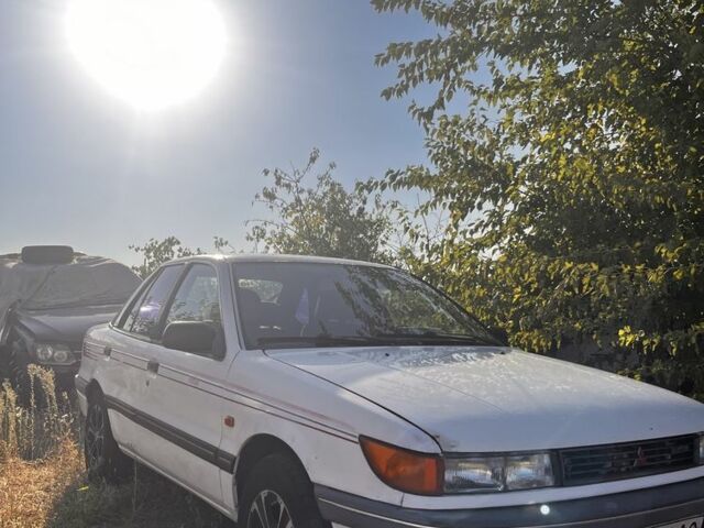 Білий Міцубісі Lancer, об'ємом двигуна 1.8 л та пробігом 350 тис. км за 2100 $, фото 1 на Automoto.ua