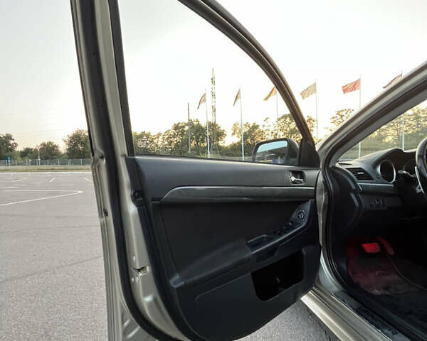 Бежевый Мицубиси Лансер, объемом двигателя 1.8 л и пробегом 285 тыс. км за 6700 $, фото 13 на Automoto.ua