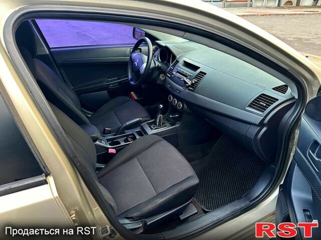 Бежевий Міцубісі Lancer, об'ємом двигуна 1.8 л та пробігом 154 тис. км за 6300 $, фото 7 на Automoto.ua