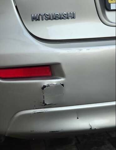 Бежевий Міцубісі Lancer, об'ємом двигуна 1.8 л та пробігом 204 тис. км за 7300 $, фото 17 на Automoto.ua