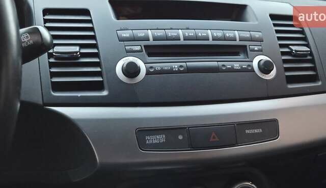 Бежевий Міцубісі Lancer, об'ємом двигуна 1.8 л та пробігом 204 тис. км за 7300 $, фото 12 на Automoto.ua