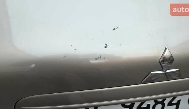 Бежевий Міцубісі Lancer, об'ємом двигуна 1.8 л та пробігом 204 тис. км за 7300 $, фото 20 на Automoto.ua