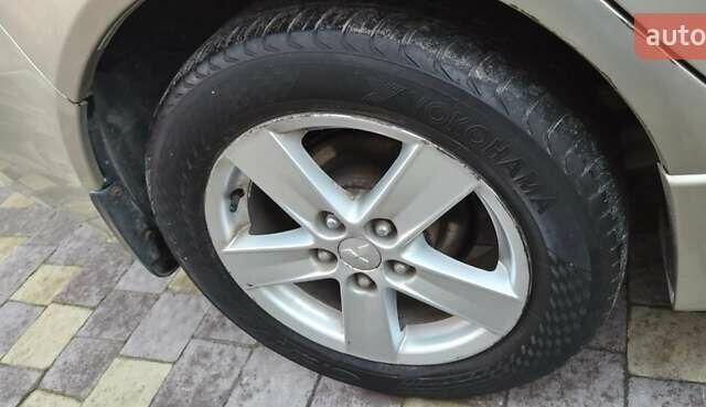 Бежевий Міцубісі Lancer, об'ємом двигуна 1.8 л та пробігом 204 тис. км за 7300 $, фото 15 на Automoto.ua