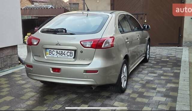 Бежевий Міцубісі Lancer, об'ємом двигуна 1.8 л та пробігом 204 тис. км за 7300 $, фото 2 на Automoto.ua