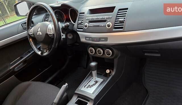 Бежевий Міцубісі Lancer, об'ємом двигуна 1.8 л та пробігом 204 тис. км за 7300 $, фото 9 на Automoto.ua