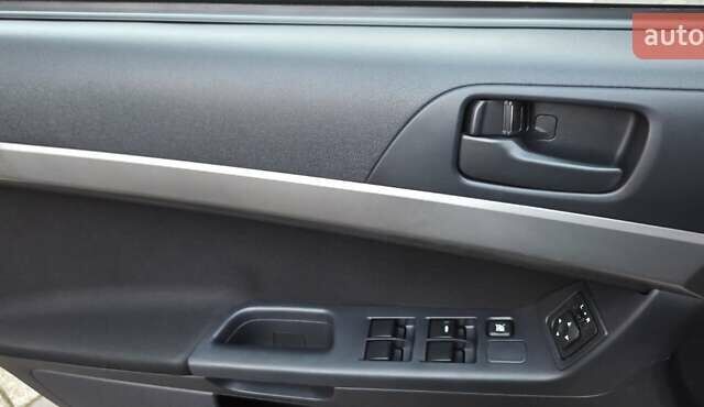 Бежевий Міцубісі Lancer, об'ємом двигуна 1.8 л та пробігом 204 тис. км за 7300 $, фото 18 на Automoto.ua
