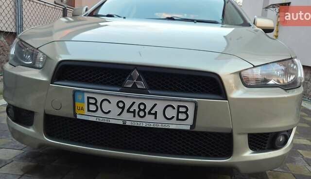 Бежевий Міцубісі Lancer, об'ємом двигуна 1.8 л та пробігом 204 тис. км за 7500 $, фото 2 на Automoto.ua