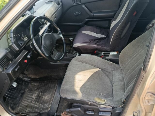 Бежевый Мицубиси Лансер, объемом двигателя 1.8 л и пробегом 380 тыс. км за 1000 $, фото 2 на Automoto.ua