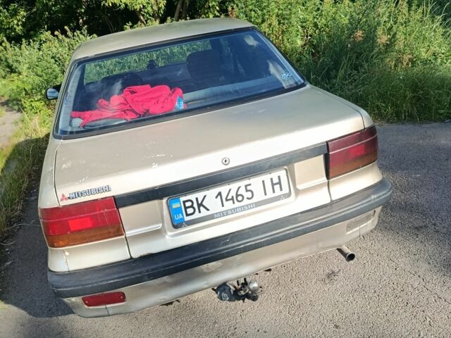 Бежевый Мицубиси Лансер, объемом двигателя 1.8 л и пробегом 380 тыс. км за 1000 $, фото 4 на Automoto.ua