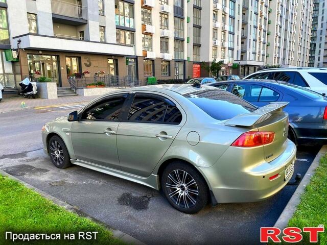 Бежевый Мицубиси Лансер, объемом двигателя 2 л и пробегом 270 тыс. км за 6800 $, фото 1 на Automoto.ua