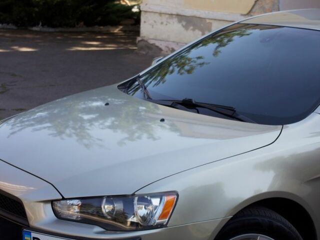 Бежевий Міцубісі Lancer, об'ємом двигуна 2 л та пробігом 220 тис. км за 7900 $, фото 2 на Automoto.ua