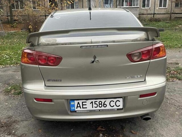 Бежевий Міцубісі Lancer, об'ємом двигуна 2 л та пробігом 290 тис. км за 6000 $, фото 3 на Automoto.ua