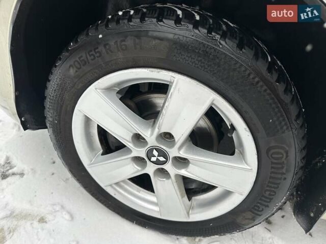 Бежевый Мицубиси Лансер, объемом двигателя 1.5 л и пробегом 380 тыс. км за 5000 $, фото 12 на Automoto.ua