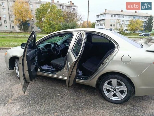 Бежевый Мицубиси Лансер, объемом двигателя 1.5 л и пробегом 326 тыс. км за 5500 $, фото 14 на Automoto.ua