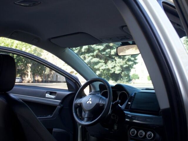 Бежевий Міцубісі Lancer, об'ємом двигуна 2 л та пробігом 220 тис. км за 7900 $, фото 8 на Automoto.ua
