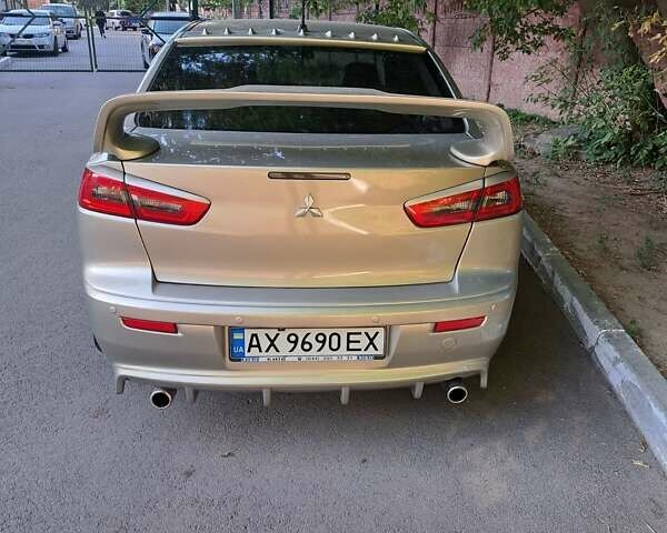 Бежевый Мицубиси Лансер, объемом двигателя 2 л и пробегом 142 тыс. км за 6300 $, фото 1 на Automoto.ua