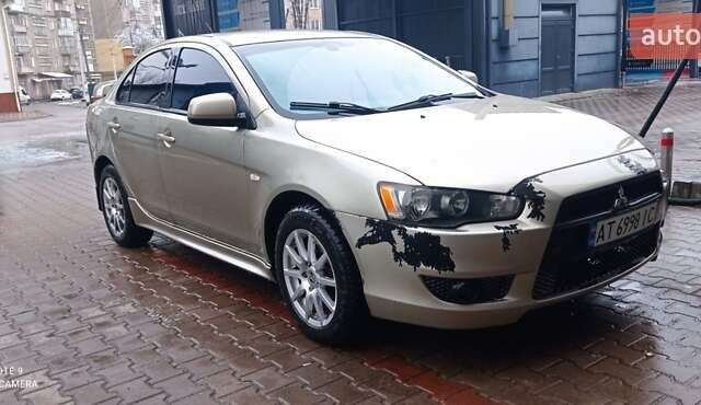 Бежевий Міцубісі Lancer, об'ємом двигуна 2 л та пробігом 200 тис. км за 6500 $, фото 1 на Automoto.ua