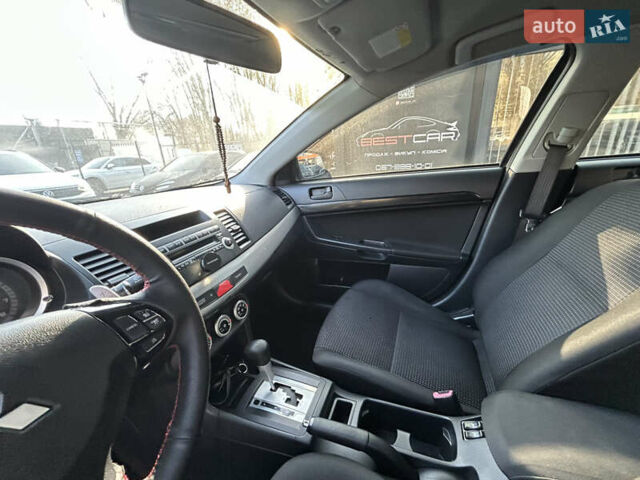 Бежевий Міцубісі Lancer, об'ємом двигуна 2 л та пробігом 250 тис. км за 8400 $, фото 18 на Automoto.ua