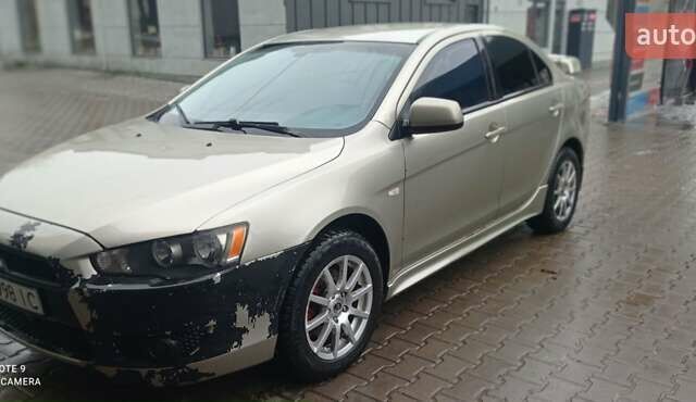 Бежевий Міцубісі Lancer, об'ємом двигуна 2 л та пробігом 200 тис. км за 6500 $, фото 3 на Automoto.ua