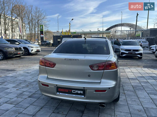 Бежевий Міцубісі Lancer, об'ємом двигуна 2 л та пробігом 250 тис. км за 8400 $, фото 11 на Automoto.ua