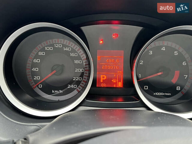 Бежевий Міцубісі Lancer, об'ємом двигуна 2 л та пробігом 240 тис. км за 6300 $, фото 11 на Automoto.ua