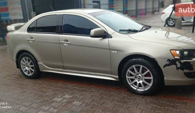 Бежевий Міцубісі Lancer, об'ємом двигуна 2 л та пробігом 200 тис. км за 6500 $, фото 4 на Automoto.ua