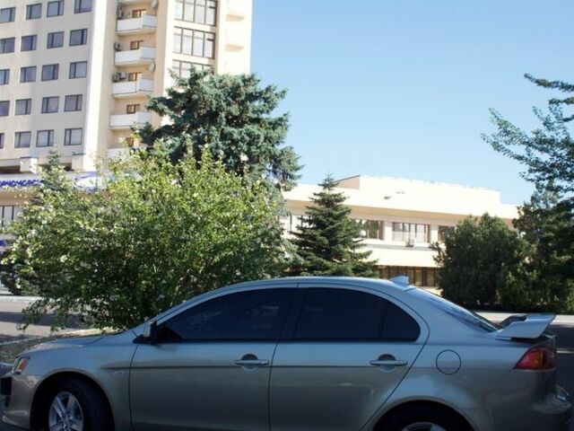 Бежевий Міцубісі Lancer, об'ємом двигуна 2 л та пробігом 220 тис. км за 7900 $, фото 4 на Automoto.ua