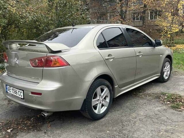 Бежевий Міцубісі Lancer, об'ємом двигуна 2 л та пробігом 290 тис. км за 6000 $, фото 1 на Automoto.ua