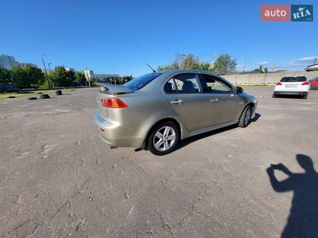 Бежевий Міцубісі Lancer, об'ємом двигуна 2 л та пробігом 180 тис. км за 6500 $, фото 6 на Automoto.ua