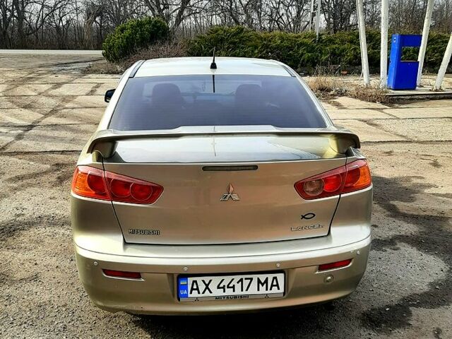 Бежевий Міцубісі Lancer, об'ємом двигуна 2 л та пробігом 270 тис. км за 5400 $, фото 2 на Automoto.ua