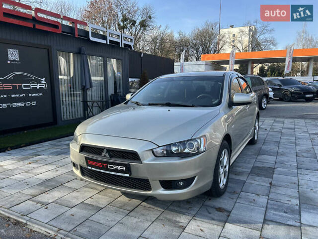 Бежевий Міцубісі Lancer, об'ємом двигуна 2 л та пробігом 250 тис. км за 8400 $, фото 3 на Automoto.ua