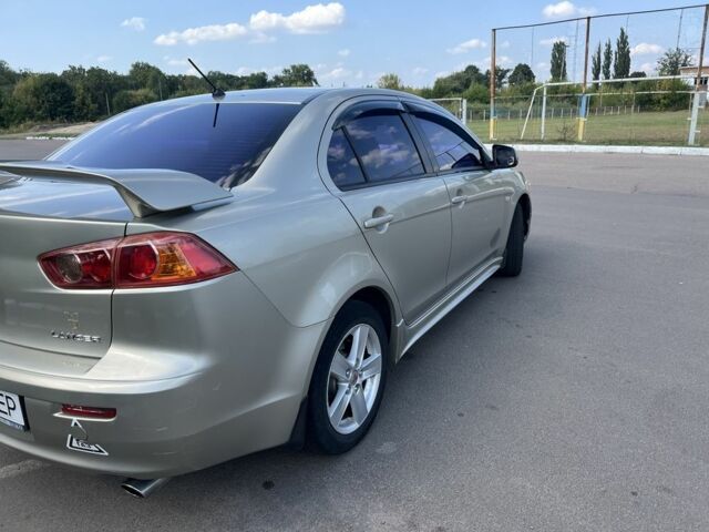 Бежевий Міцубісі Lancer, об'ємом двигуна 2 л та пробігом 300 тис. км за 5400 $, фото 4 на Automoto.ua