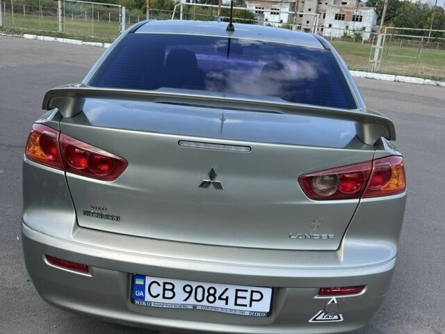 Бежевий Міцубісі Lancer, об'ємом двигуна 2 л та пробігом 300 тис. км за 5400 $, фото 3 на Automoto.ua