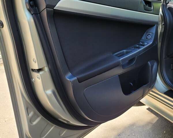 Мицубиси Лансер 2007 в Запорожье на Automoto.ua Бежевый Мицубиси Лансер, объемом двигателя 2 л и пробегом 114 тыс. км за 7450 $, фото 15 на Automoto.ua