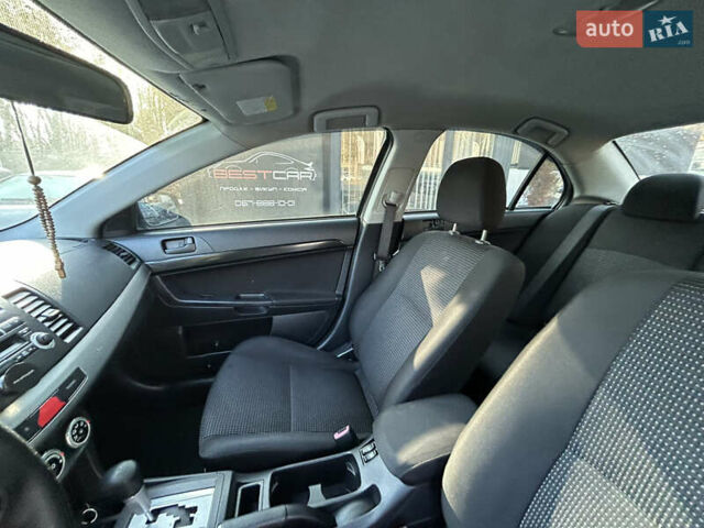 Бежевий Міцубісі Lancer, об'ємом двигуна 2 л та пробігом 250 тис. км за 8400 $, фото 17 на Automoto.ua