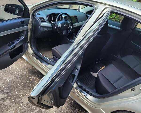 Мицубиси Лансер 2007 в Запорожье на Automoto.ua Бежевый Мицубиси Лансер, объемом двигателя 2 л и пробегом 114 тыс. км за 7450 $, фото 2 на Automoto.ua