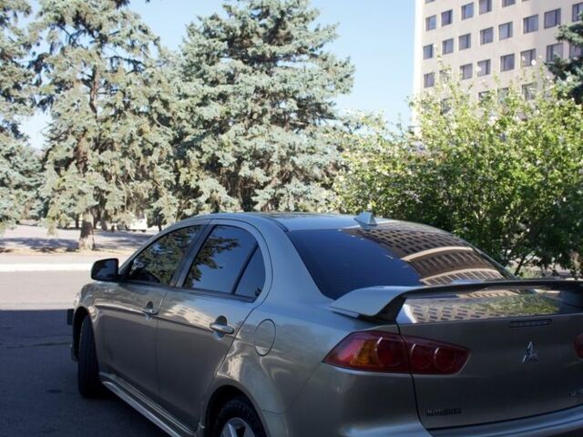 Бежевий Міцубісі Lancer, об'ємом двигуна 2 л та пробігом 220 тис. км за 7900 $, фото 6 на Automoto.ua