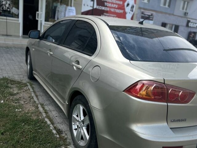 Бежевий Міцубісі Lancer, об'ємом двигуна 2 л та пробігом 215 тис. км за 6500 $, фото 3 на Automoto.ua