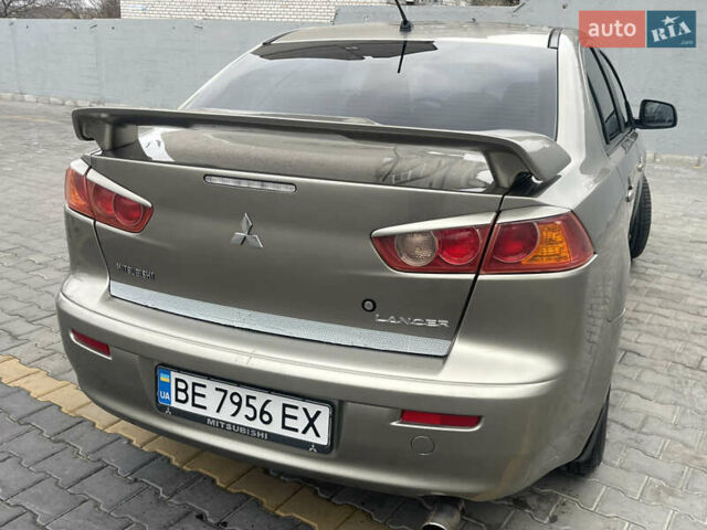 Бежевый Мицубиси Лансер, объемом двигателя 2 л и пробегом 230 тыс. км за 5599 $, фото 11 на Automoto.ua
