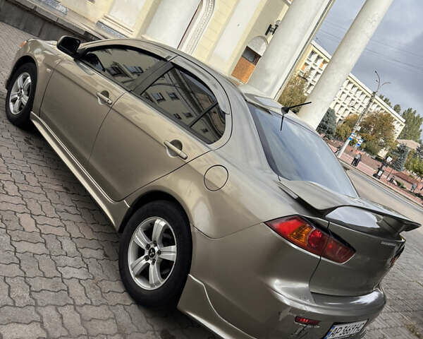 Бежевый Мицубиси Лансер, объемом двигателя 2 л и пробегом 185 тыс. км за 5200 $, фото 10 на Automoto.ua