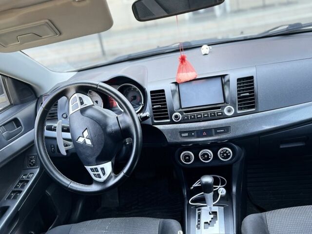 Бежевий Міцубісі Lancer, об'ємом двигуна 2 л та пробігом 215 тис. км за 6500 $, фото 4 на Automoto.ua