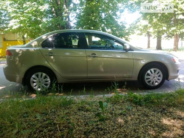 Бежевий Міцубісі Lancer, об'ємом двигуна 1.5 л та пробігом 232 тис. км за 4999 $, фото 8 на Automoto.ua