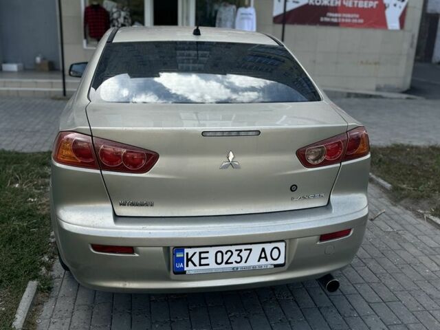 Бежевий Міцубісі Lancer, об'ємом двигуна 2 л та пробігом 215 тис. км за 6500 $, фото 1 на Automoto.ua