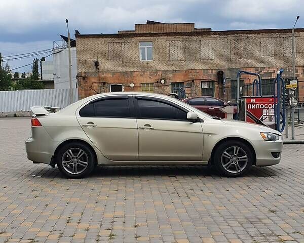 Бежевий Міцубісі Lancer, об'ємом двигуна 1.5 л та пробігом 185 тис. км за 6550 $, фото 24 на Automoto.ua