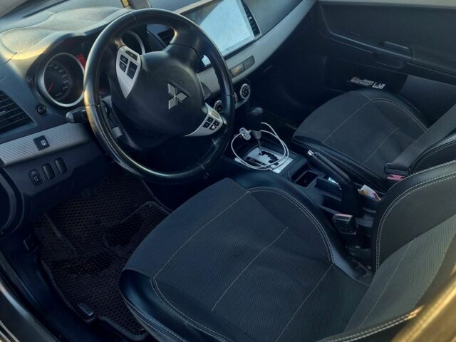 Бежевый Мицубиси Лансер, объемом двигателя 2 л и пробегом 236 тыс. км за 5500 $, фото 3 на Automoto.ua