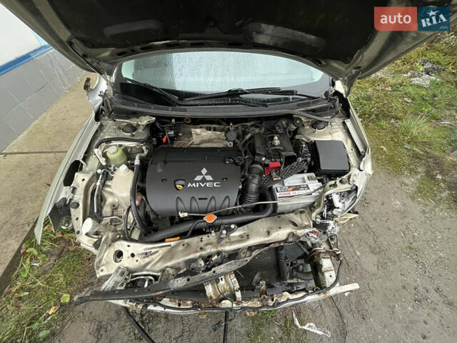 Бежевый Мицубиси Лансер, объемом двигателя 2 л и пробегом 278 тыс. км за 3100 $, фото 12 на Automoto.ua