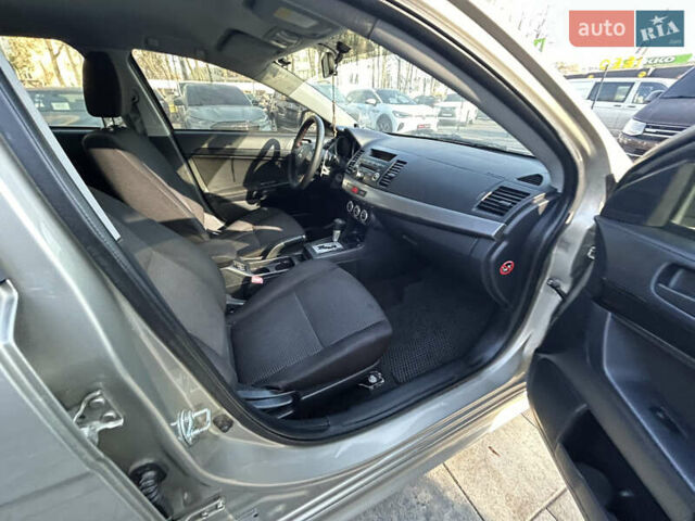 Бежевий Міцубісі Lancer, об'ємом двигуна 2 л та пробігом 250 тис. км за 8400 $, фото 27 на Automoto.ua