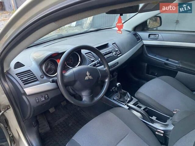 Бежевый Мицубиси Лансер, объемом двигателя 1.5 л и пробегом 242 тыс. км за 5999 $, фото 17 на Automoto.ua