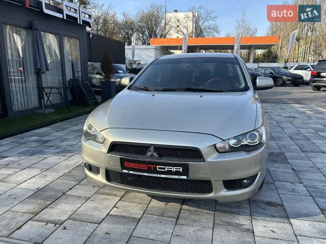 Бежевий Міцубісі Lancer, об'ємом двигуна 2 л та пробігом 250 тис. км за 8400 $, фото 5 на Automoto.ua